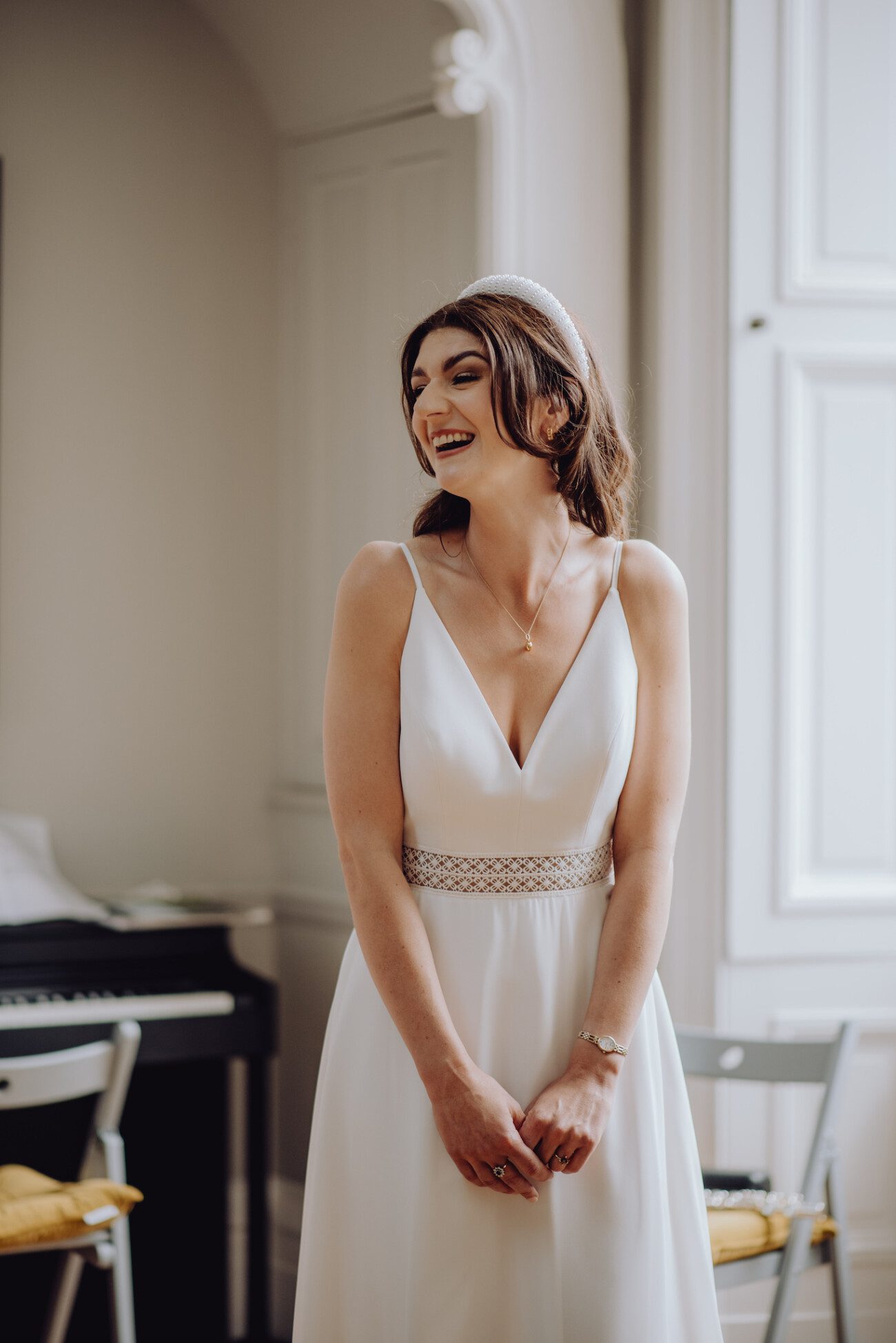 Bride laughing during wedding ceremony
