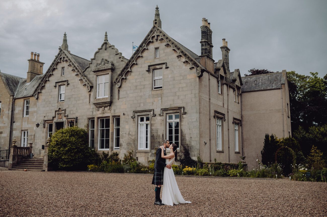 Bride and groom outside Netherbyres House