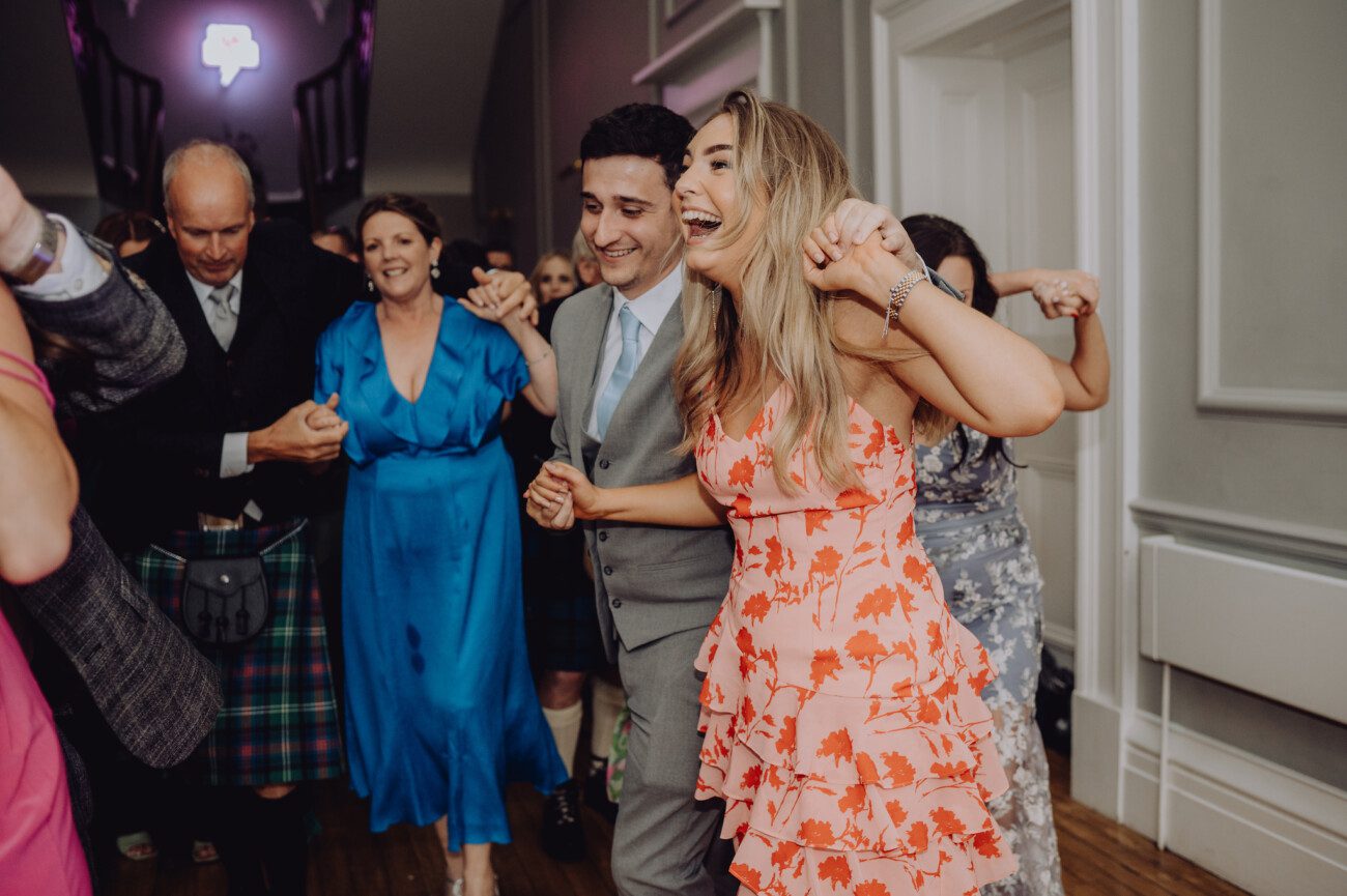 Wedding guests dancing