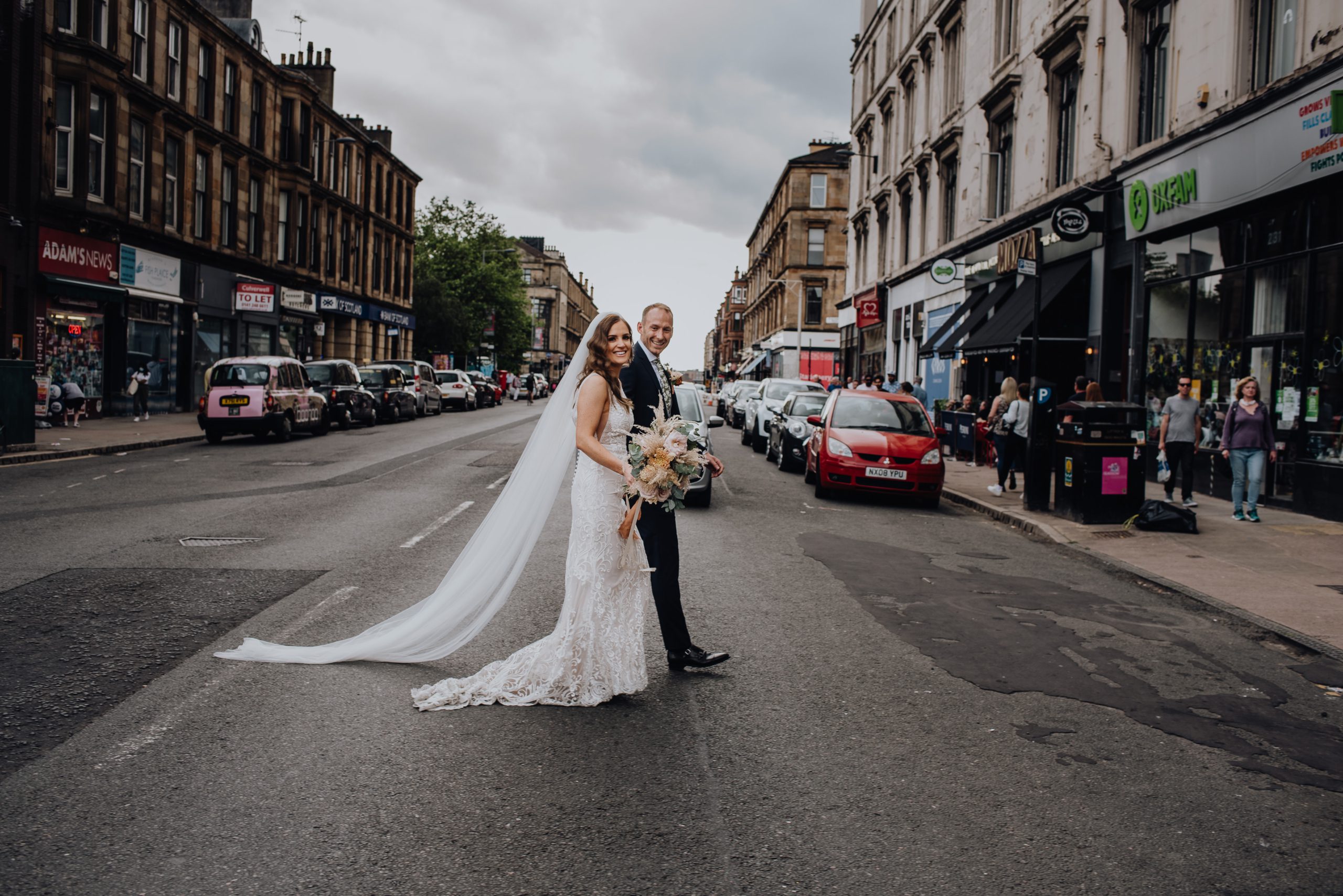 Couple crossing the road